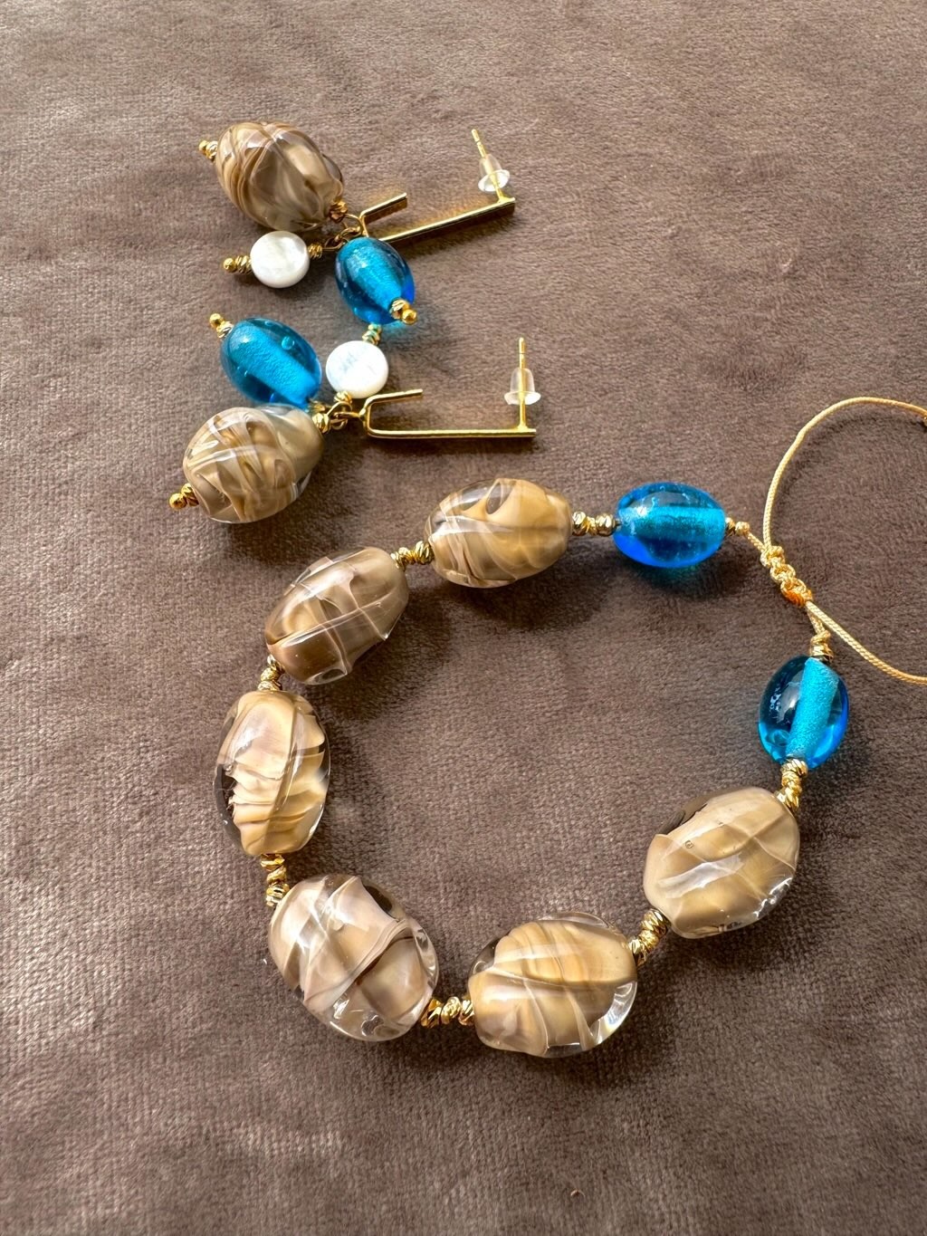 ZEYNEB Atelier - earrings and bracelet